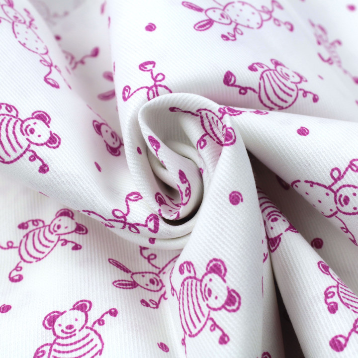 Tissu coton blanc milleraie imprimés lapins