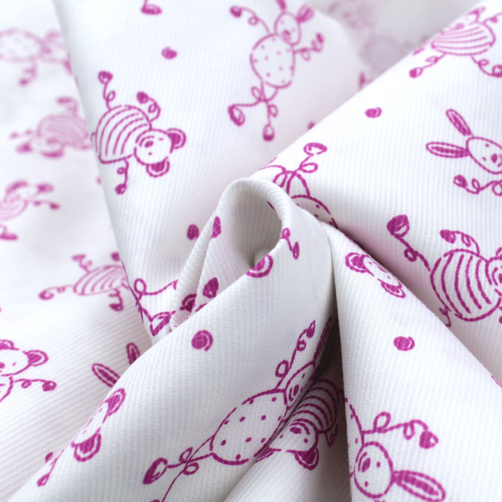 Tissu coton blanc milleraie imprimés lapins