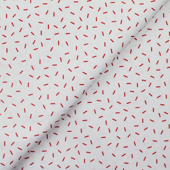 Tissu coton blanc milleraie imprimé confettis rouge