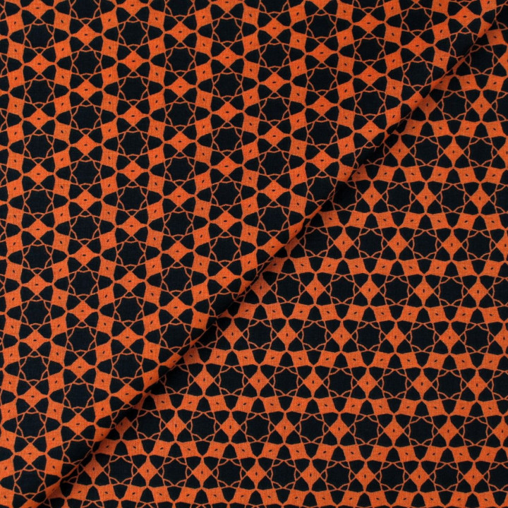 Tissu coton orange imprimé géométrique étoiles noir