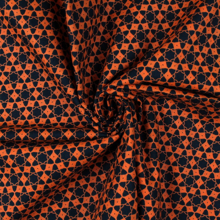 Tissu coton orange imprimé géométrique étoiles noir