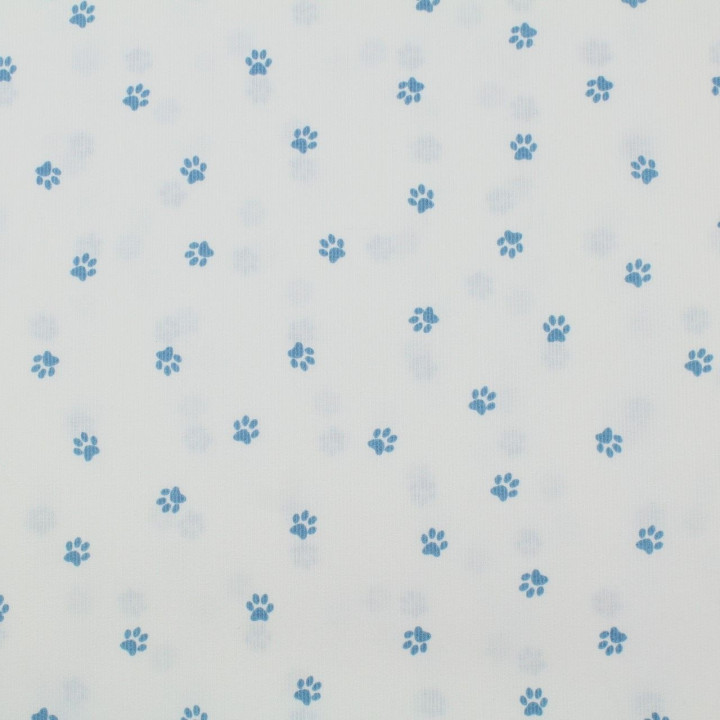 Tissu coton blanc milleraie imprimé empreinte pattes de chien bleu ciel