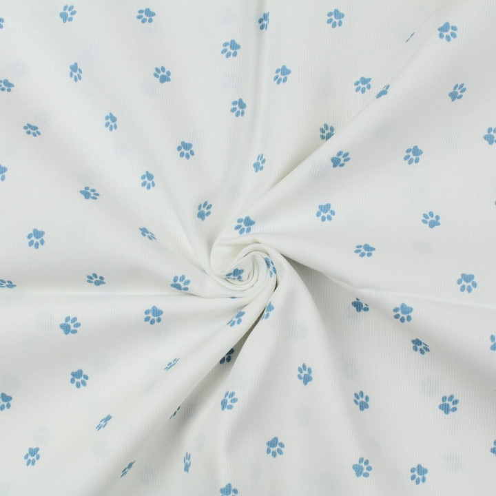 Tissu coton blanc milleraie imprimé empreinte pattes de chien bleu ciel