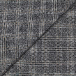 Tissu écossais blanc et noir avec liseré rouge