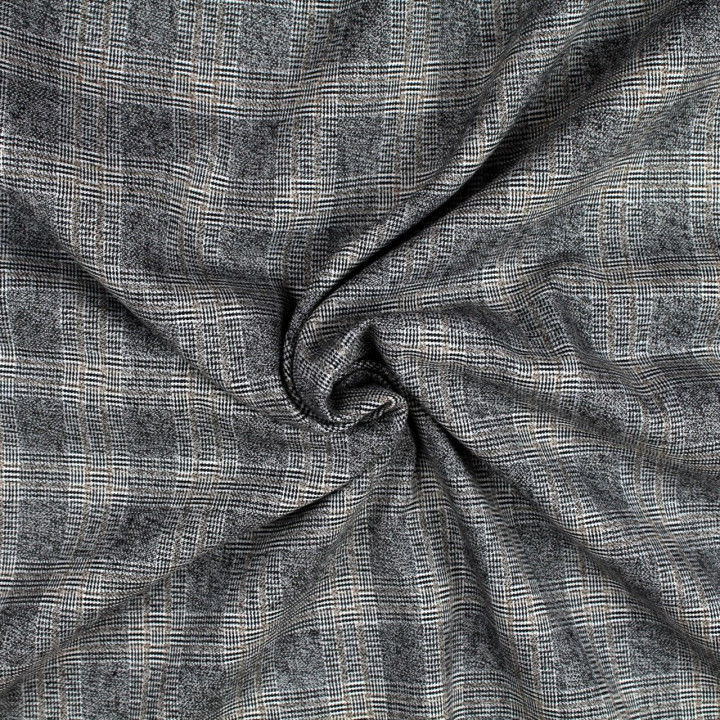 Tissu écossais blanc et noir avec liseré rouge