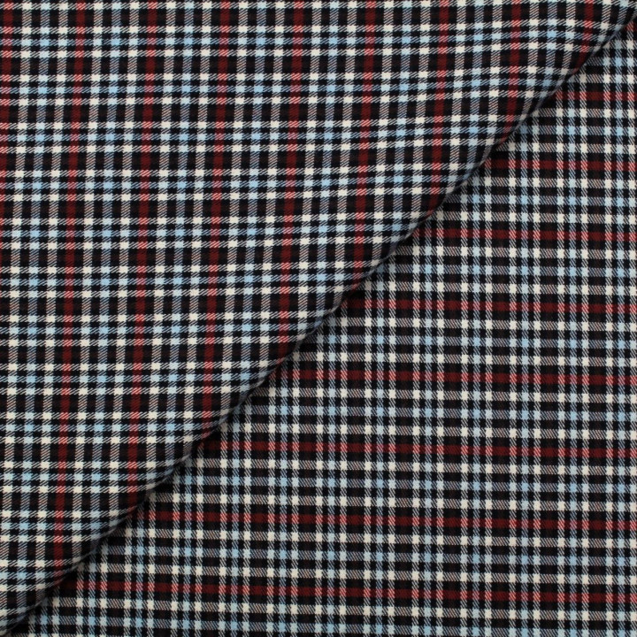 Tissu écossais noir, écru, bordeaux et bleu ciel