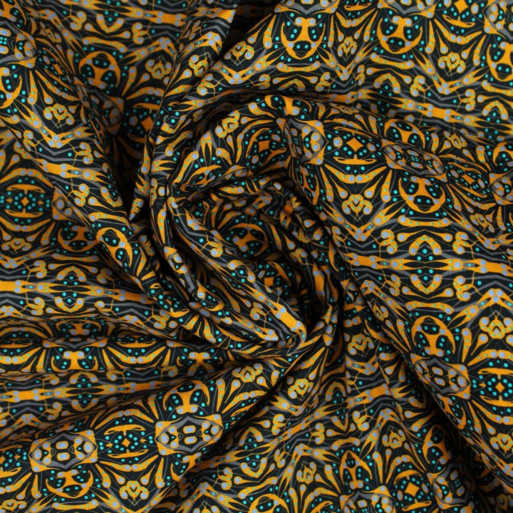 Tissu coton noir imprimé géométrique orange