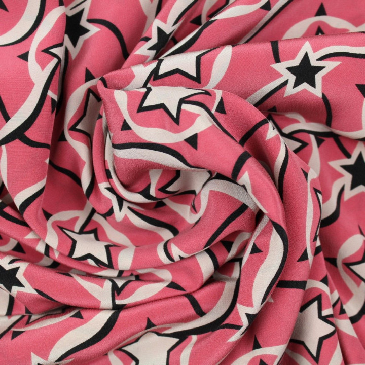 Tissu mousseline de soie rose barbie imprimé étoiles