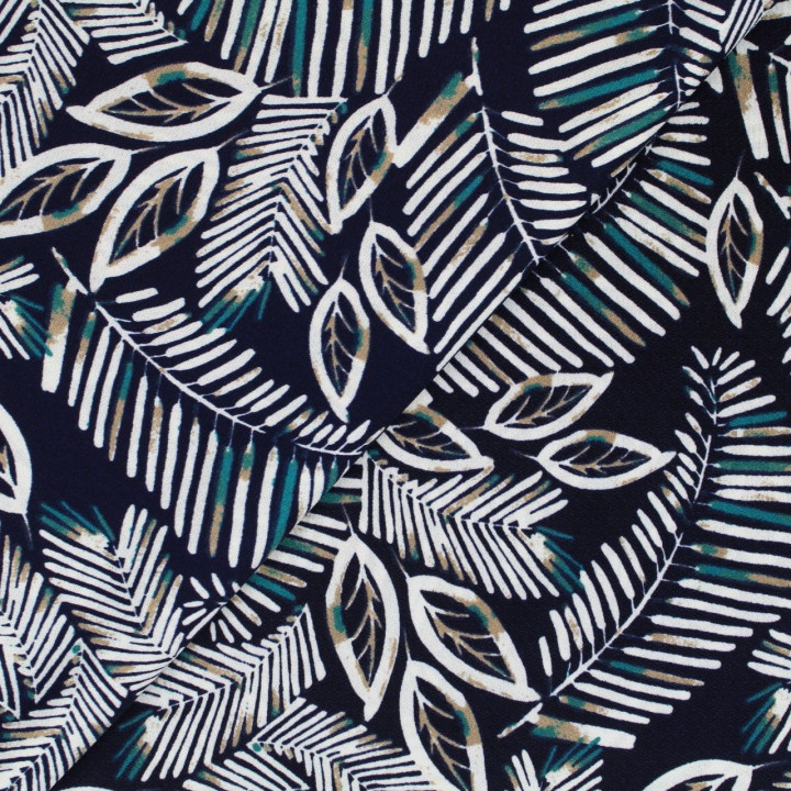 Tissu jersey polyester bleu marine imprimé feuillages