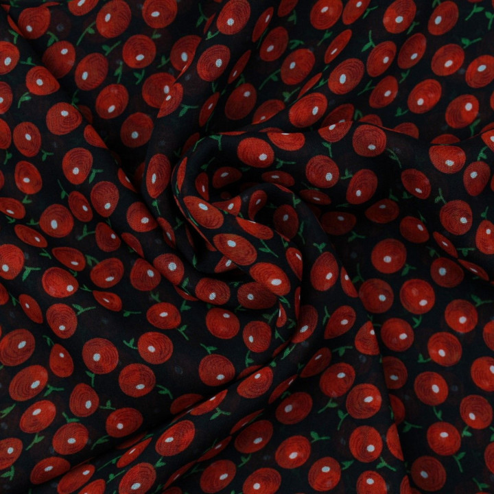 Tissus mousseline polyester noir imprimé fleurs rouge