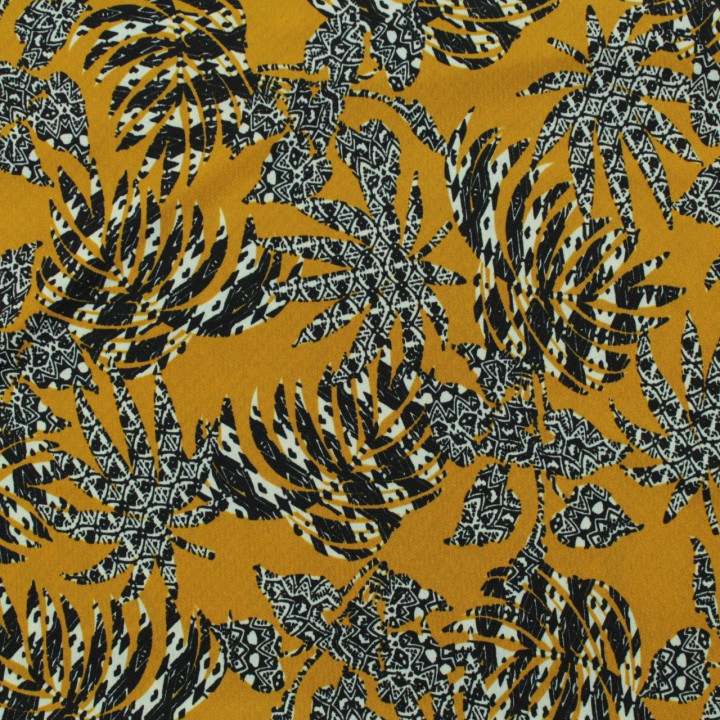 Tissu jersey polyester moutarde imprimé feuillage