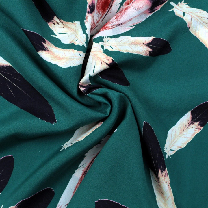 Tissus satin polyester vert bouteille imprimé plume