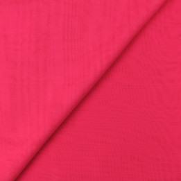 Tissu mousseline uni de couleur fuchsia fluo