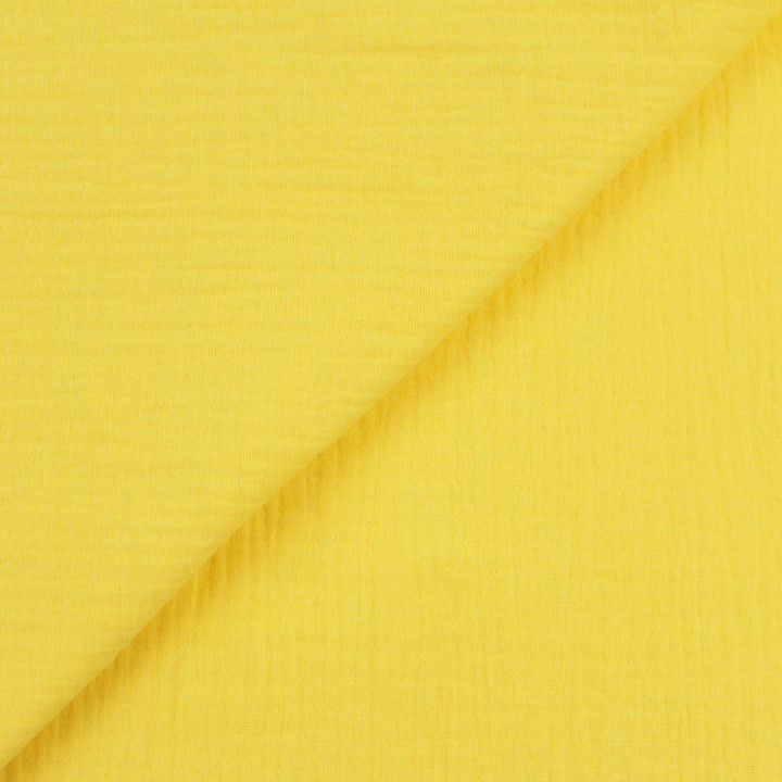 Tissu coton double gaze uni de couleur jaune