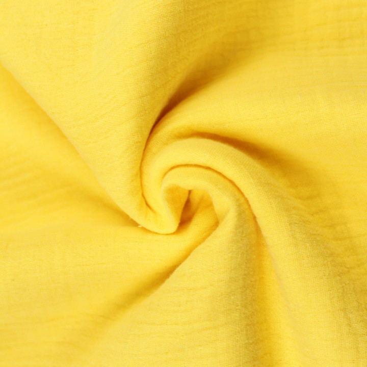 Tissu coton double gaze uni de couleur jaune