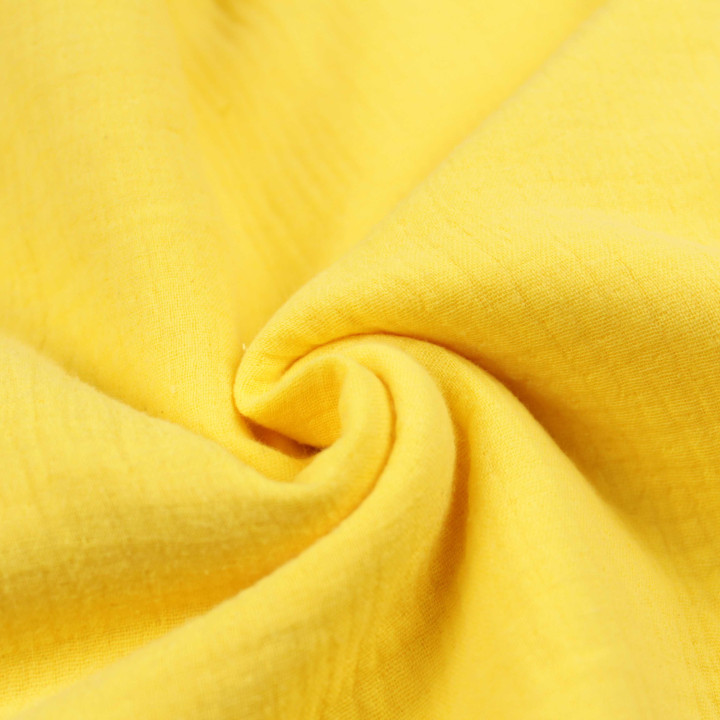 Tissu coton double gaze uni de couleur jaune