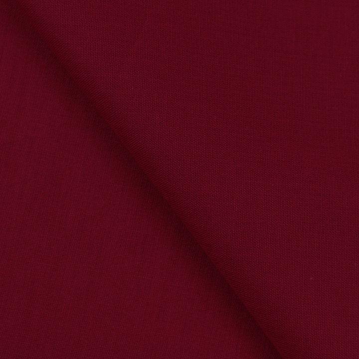 Tissu coton uni satiné de couleur bordeaux