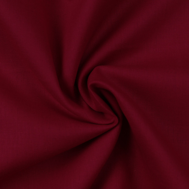 Tissu coton uni satiné de couleur bordeaux