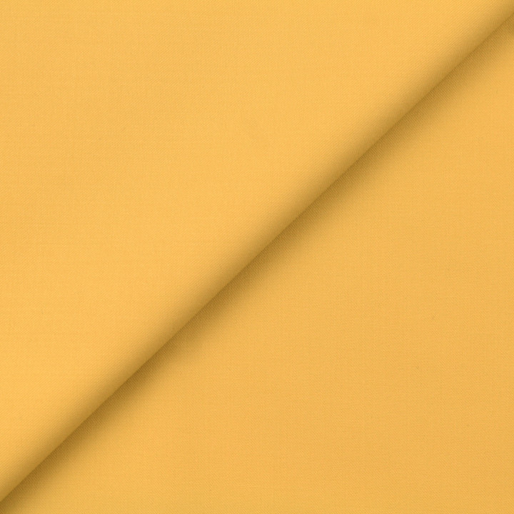 Tissu costume uni de couleur jaune paille