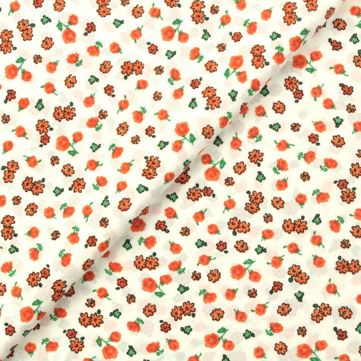Tissu en viscose blanc imprimé fleuri rouge