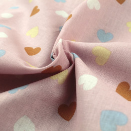 Tissu coton rose imprimé cœurs - Idéal pour habillement et couture au mètre