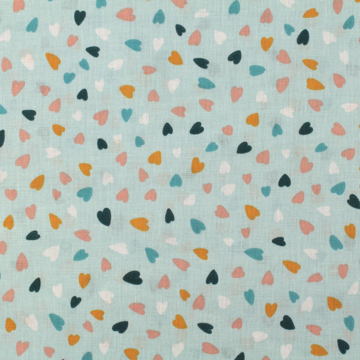Tissu coton bleu claire imprimé cœurs - Idéal pour habillement et couture au mètre