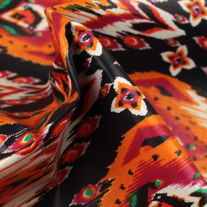 Tissu Wax de Haute Qualité à Motifs Géométriques Rouge, Orange, Noir, Vert et Blanc