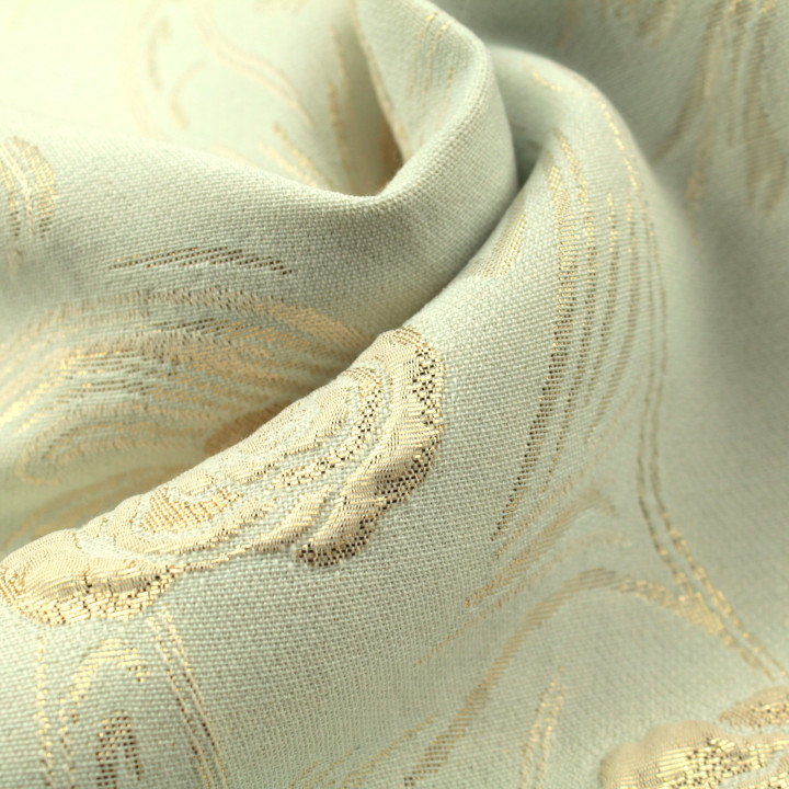 Tissu brocart vert amande à motif floral brillant