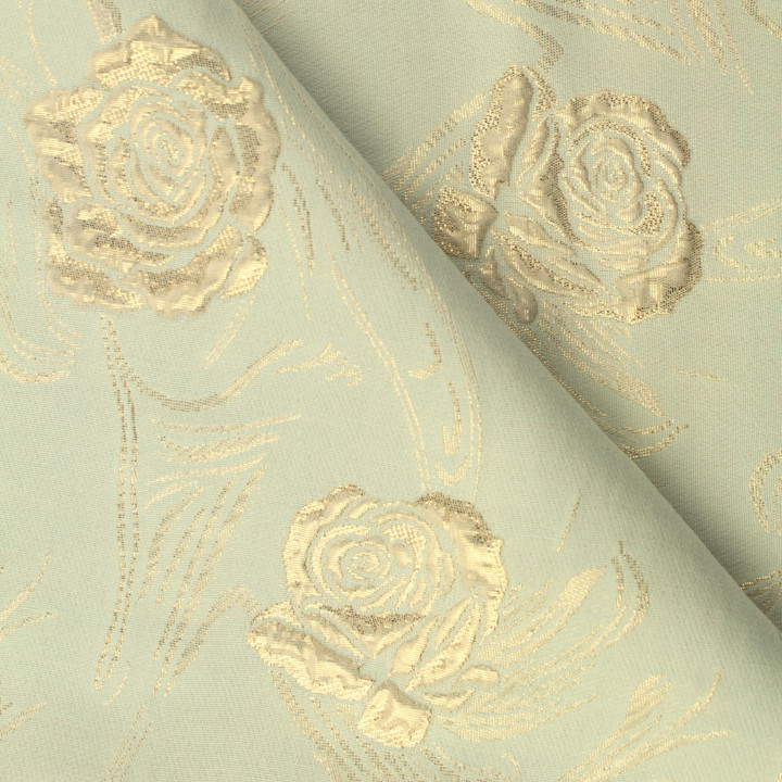 Tissu brocart vert amande à motif floral brillant