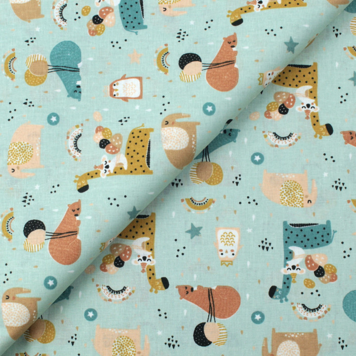Tissu en coton bleu ciel avec imprimé d'animaux élégants