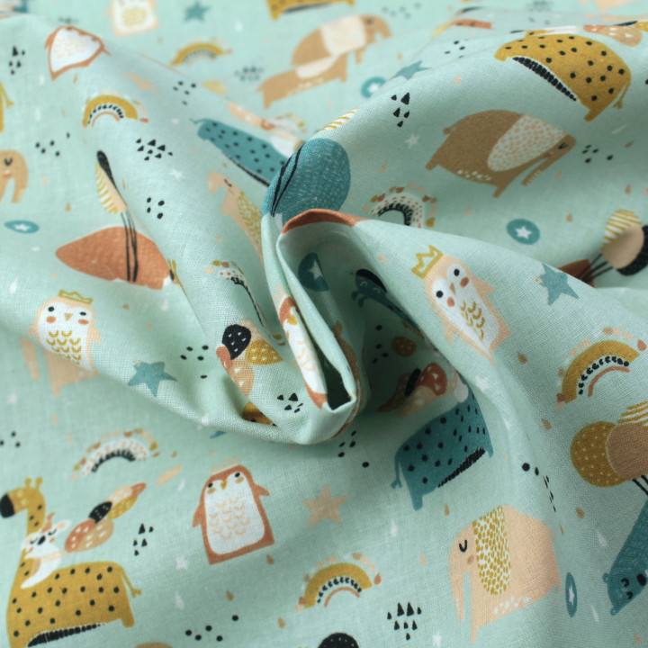 Tissu en coton bleu ciel avec imprimé d'animaux élégants
