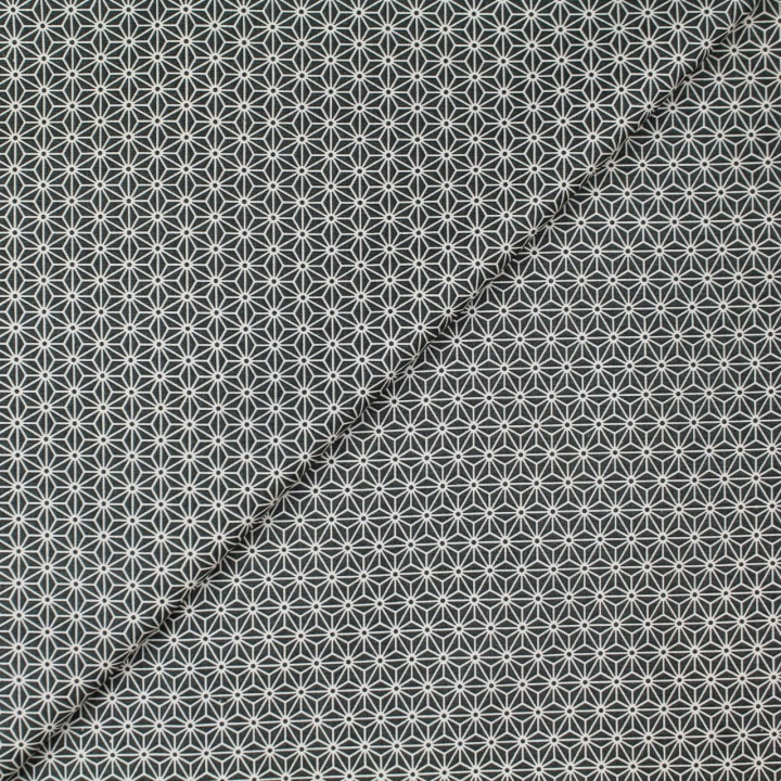 Tissu en coton rose saumon clair avec imprimé pingouins et ours.