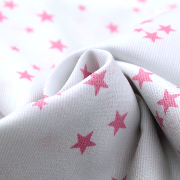 Tissu coton blanc milleraies avec motif étoiles roses