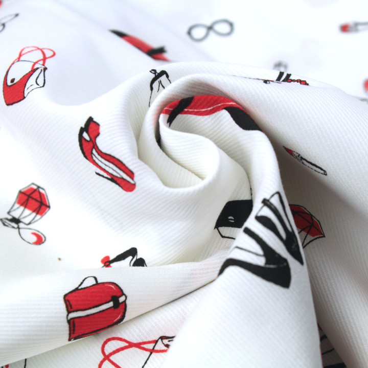 Tissu coton milleraies motif accessoires féminins mode rouge et noir