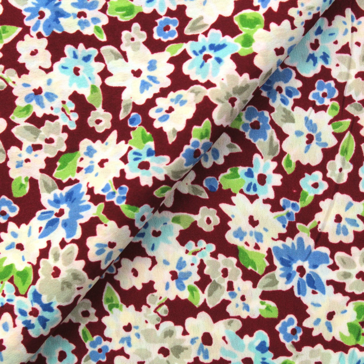 Tissu polyester rouge à imprimé fleuri