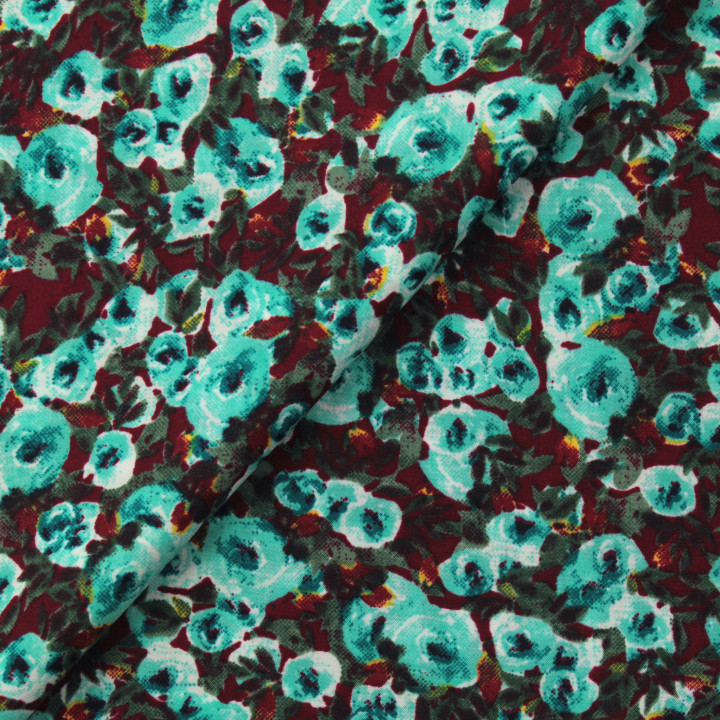 Tissu polyester bordeaux foncé à imprimé floral turquoise