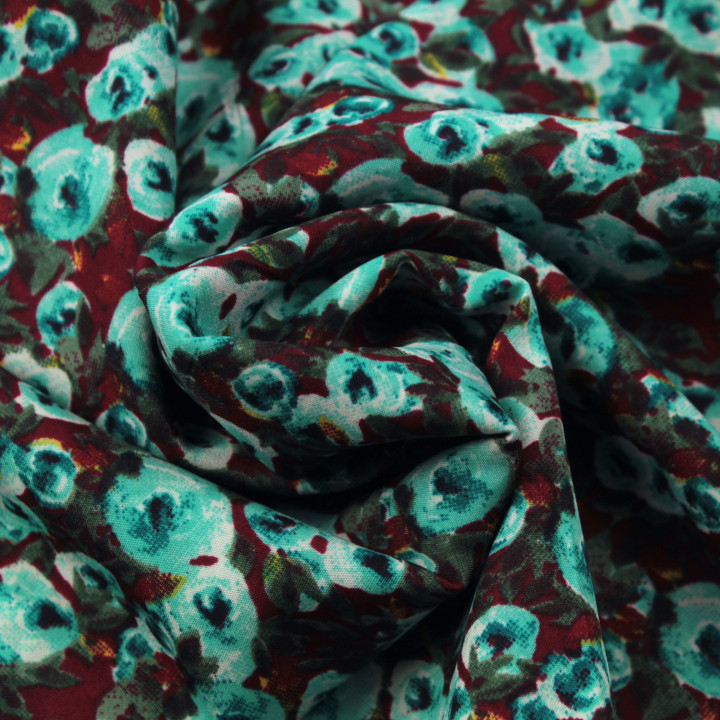 Tissu polyester bordeaux foncé à imprimé floral turquoise
