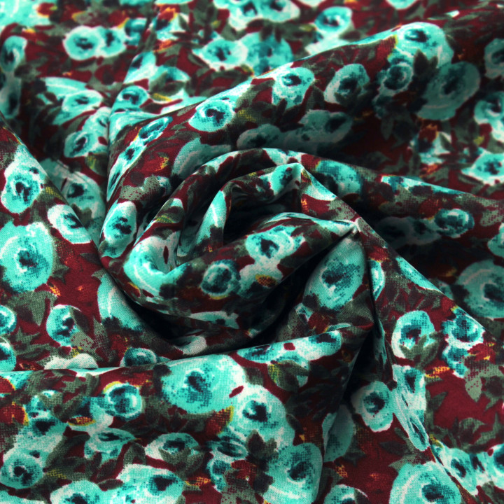 Tissu polyester bordeaux foncé à imprimé floral turquoise