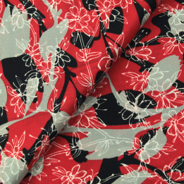 Tissu polyester rouge à imprimé floral gris et noir géométrique