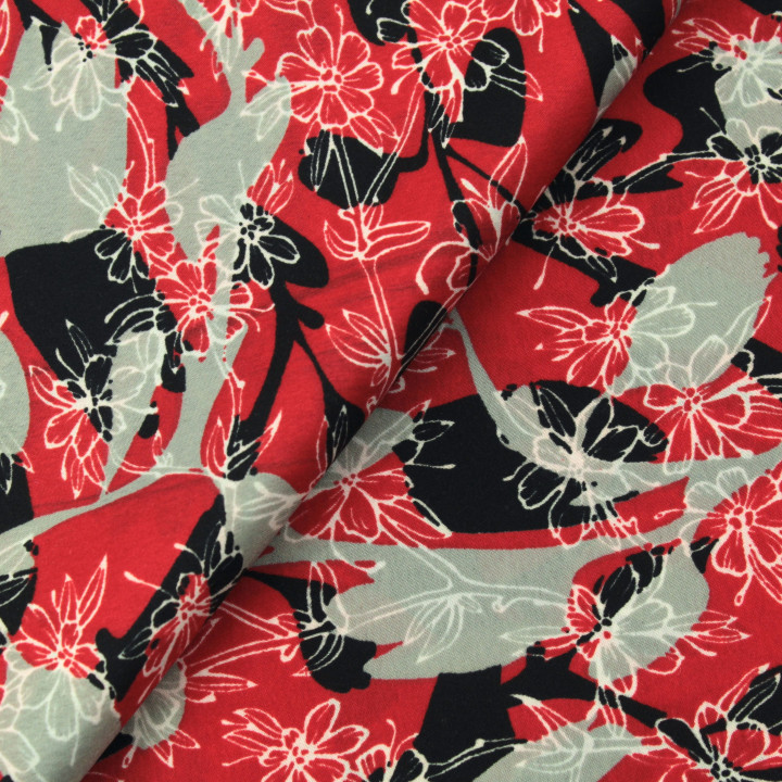 Tissu polyester rouge à imprimé floral gris et noir géométrique