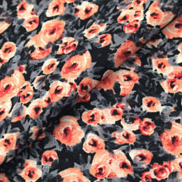 Tissu polyester noir à imprimé floral gris et orange