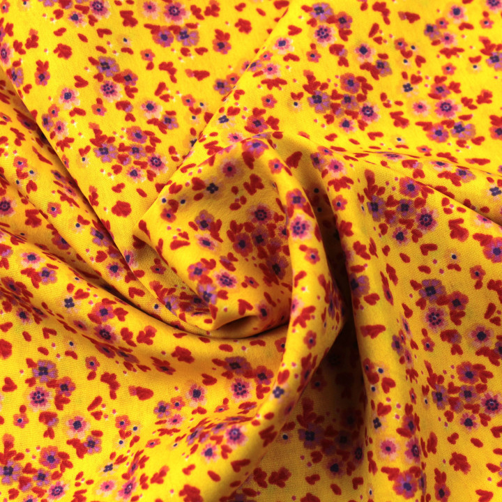 Tissu polyester jeune roi à imprimé floral orange