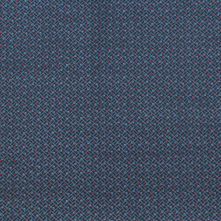 Tissu en coton bleu nuit à motif géométrique de petits triangles rouges et bleus
