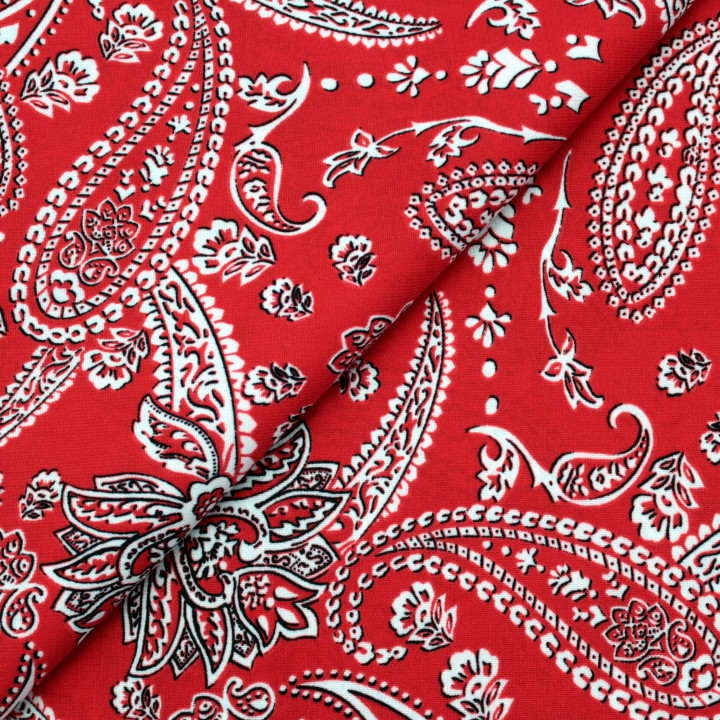 Tissu Rouge Vif à Motifs Blancs Contour Noir – Pour des Pièces Audacieuses