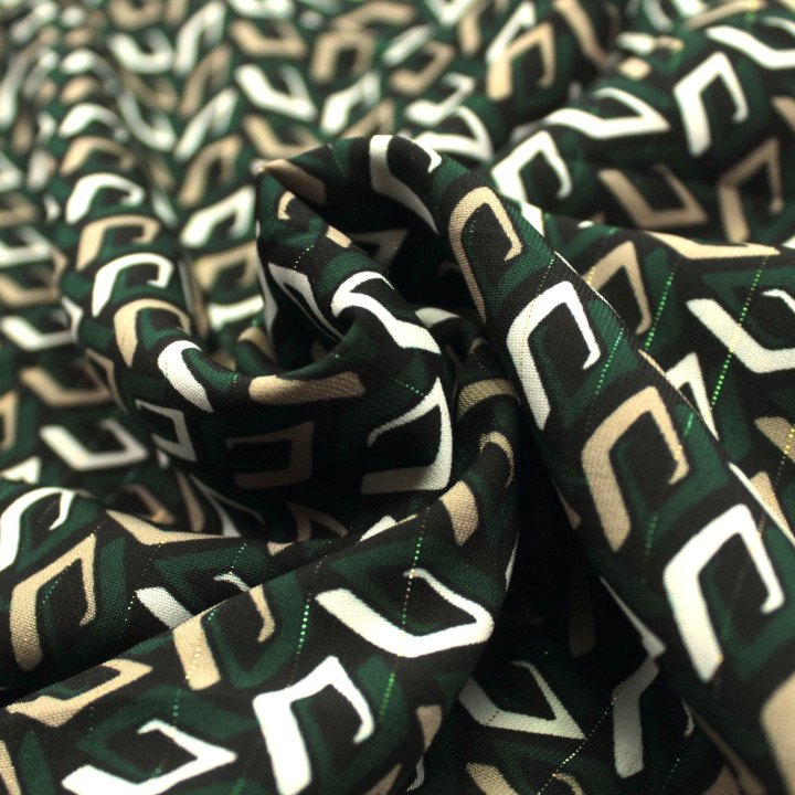 Tissu Noir à Imprimés Géométriques Blanc, Vert et Beige Foncé avec Liseré Brillant