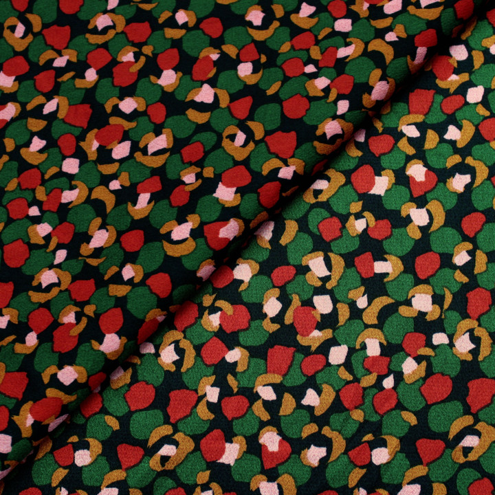Tissu Noir à Imprimés Géométriques Rouge, Vert, Doré et Beige Foncé Brillant