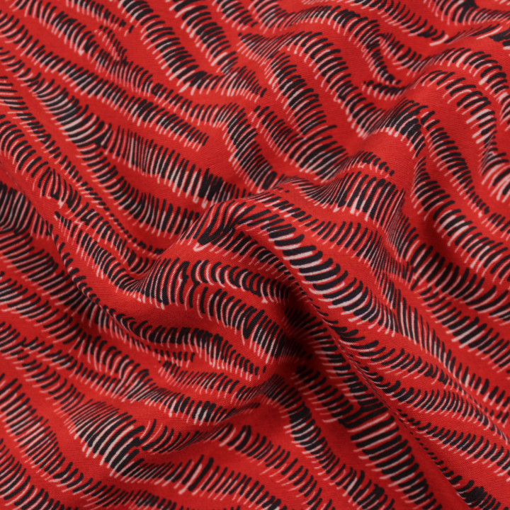 Tissu rouge à motif vague géométrique noir – Moderne et facile à coudre