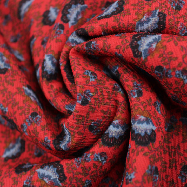 Tissu crêpe polyester rouge à petits dinosaures bleu – Léger, fluide et idéal pour couture créative