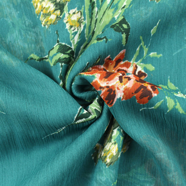 Tissu Mousseline Turquoise à Motifs Floraux – Léger, Aérien et Fluide pour Vêtements et Créations Couture