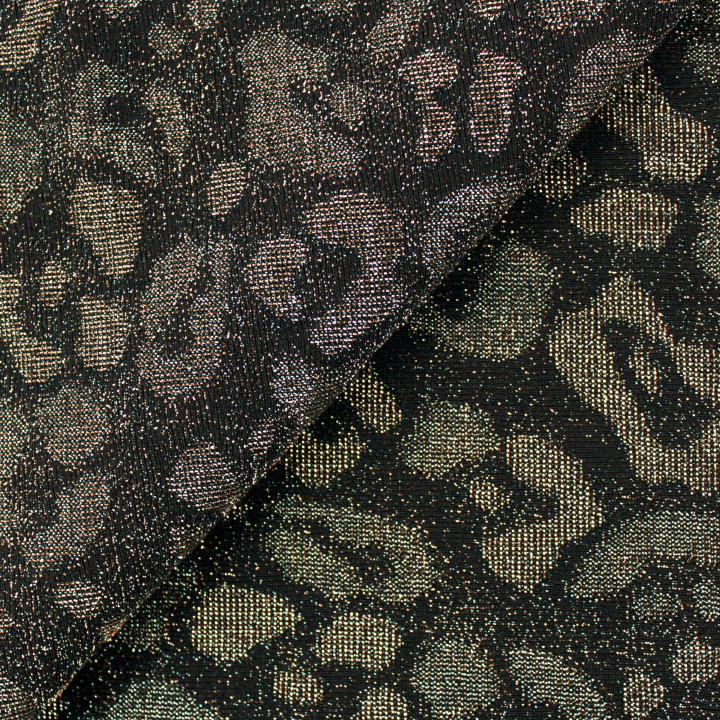 Tissu jersey noir motifs géométriques bronze et argent brillant et extensible